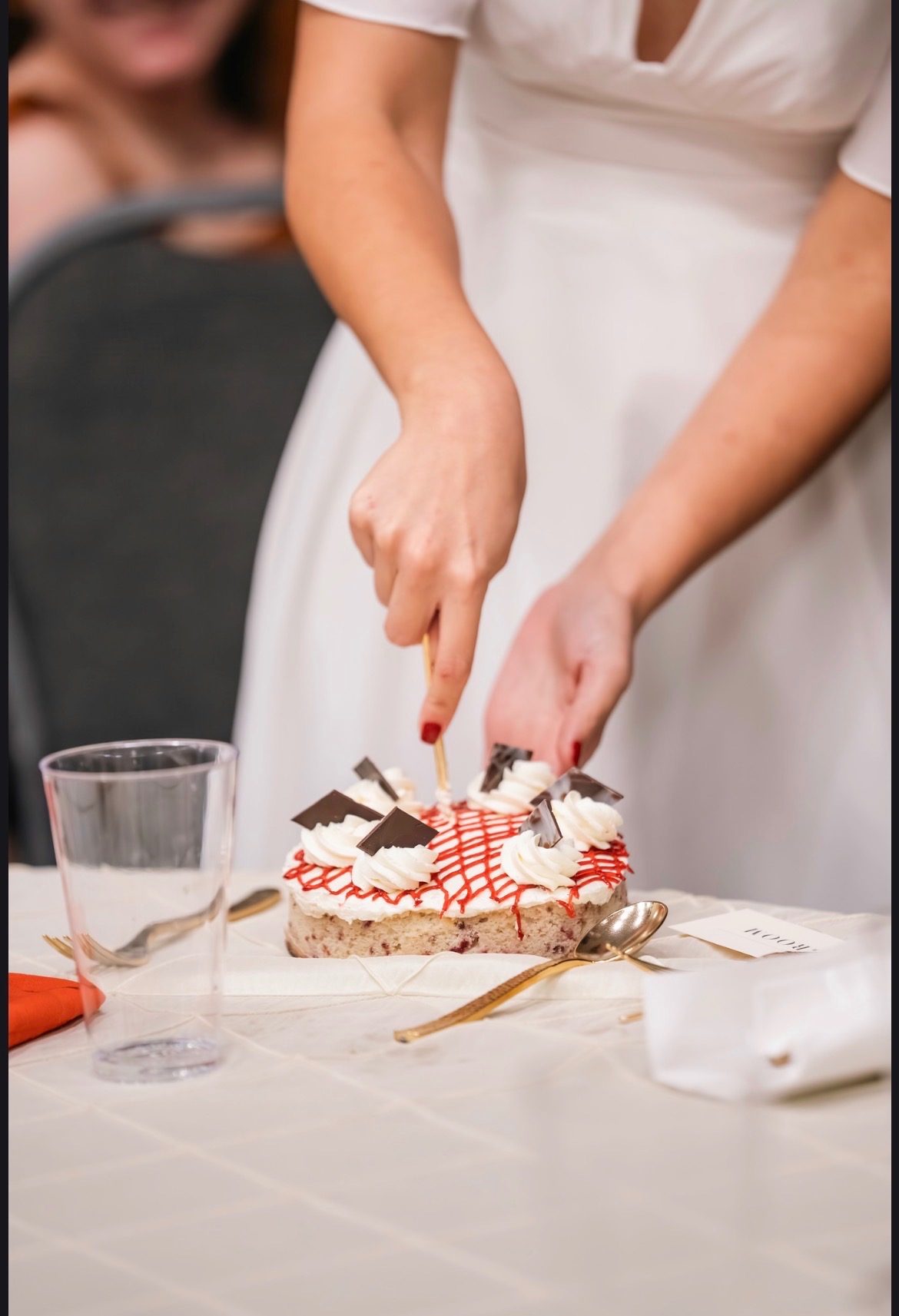Bride cutting the wedding cake