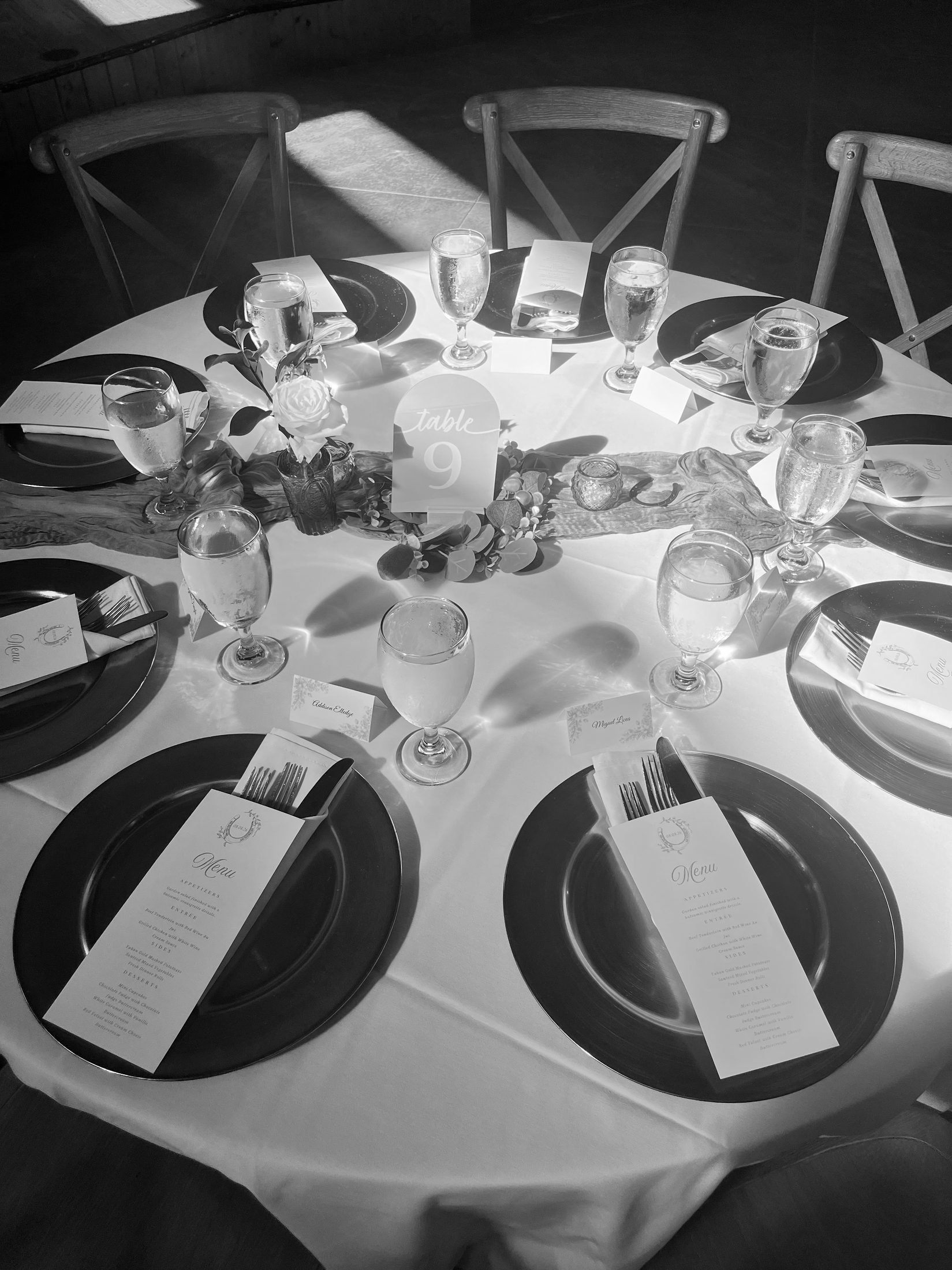 Reception table set for the day, black and white